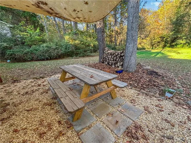 a view of a yard with patio