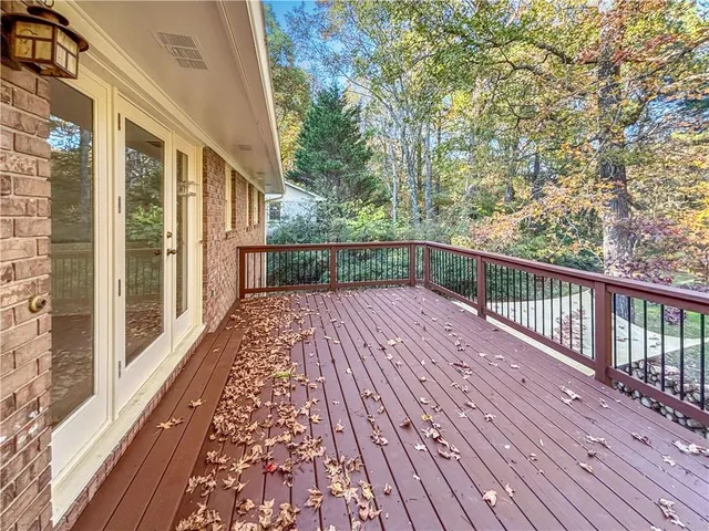 a view of balcony with wooden floor