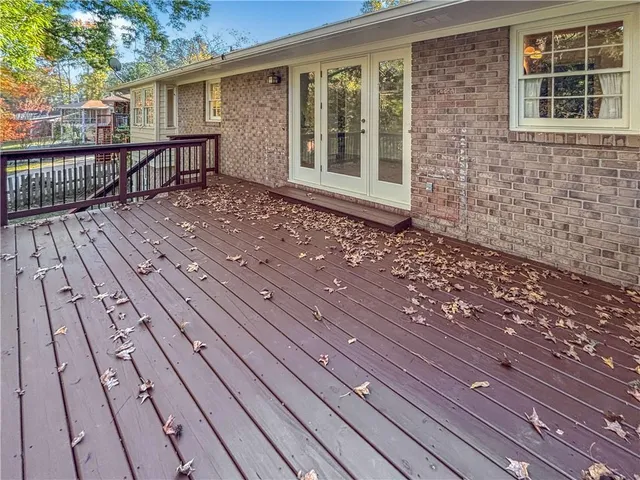 a front view of a house with a wooden floor