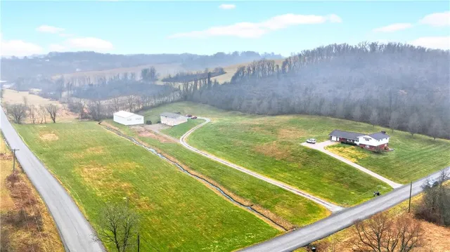 a view of a table and chairs in the terrace