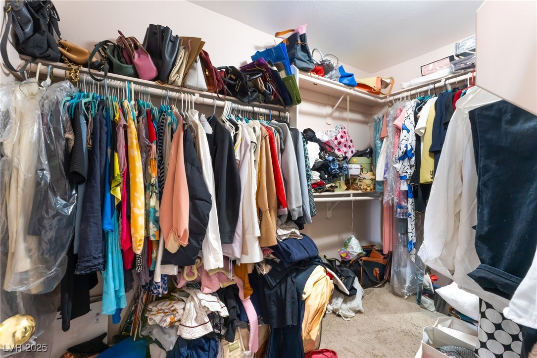 4656 East Desert Inn Road Las Vegas, NV 89121 - Photo 26 of 98 4656 E DI Walk in closet with carpet flooring