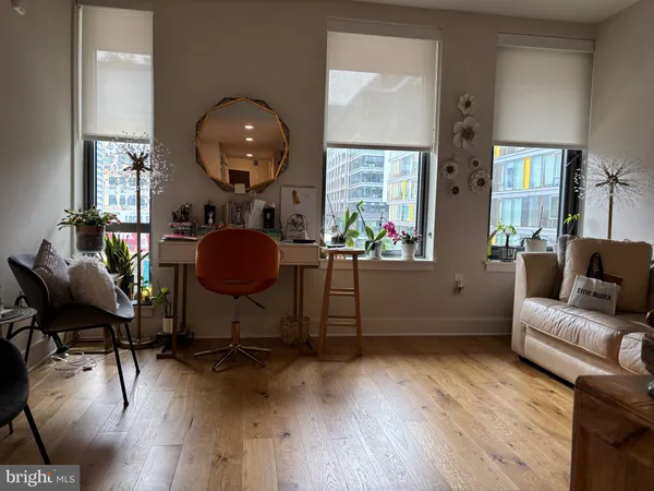 a lobby with furniture and window