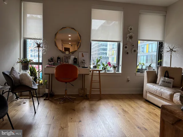 a lobby with furniture and window