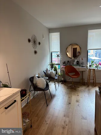 a terrace with a kitchen island a sink and a stove