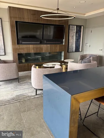 a bathroom with a shower and a sink