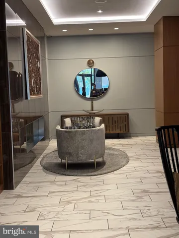 a workspace with furniture and a potted plant