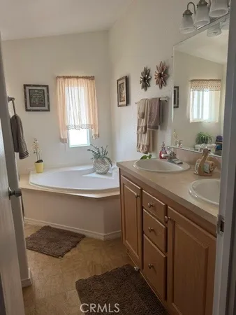 a bed room with a bed and a window