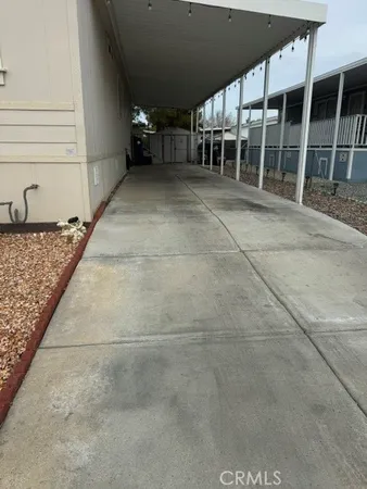 a view of a backyard of the house