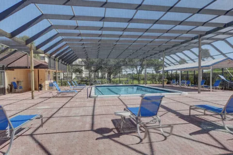 a view of a balcony with a swimming pool