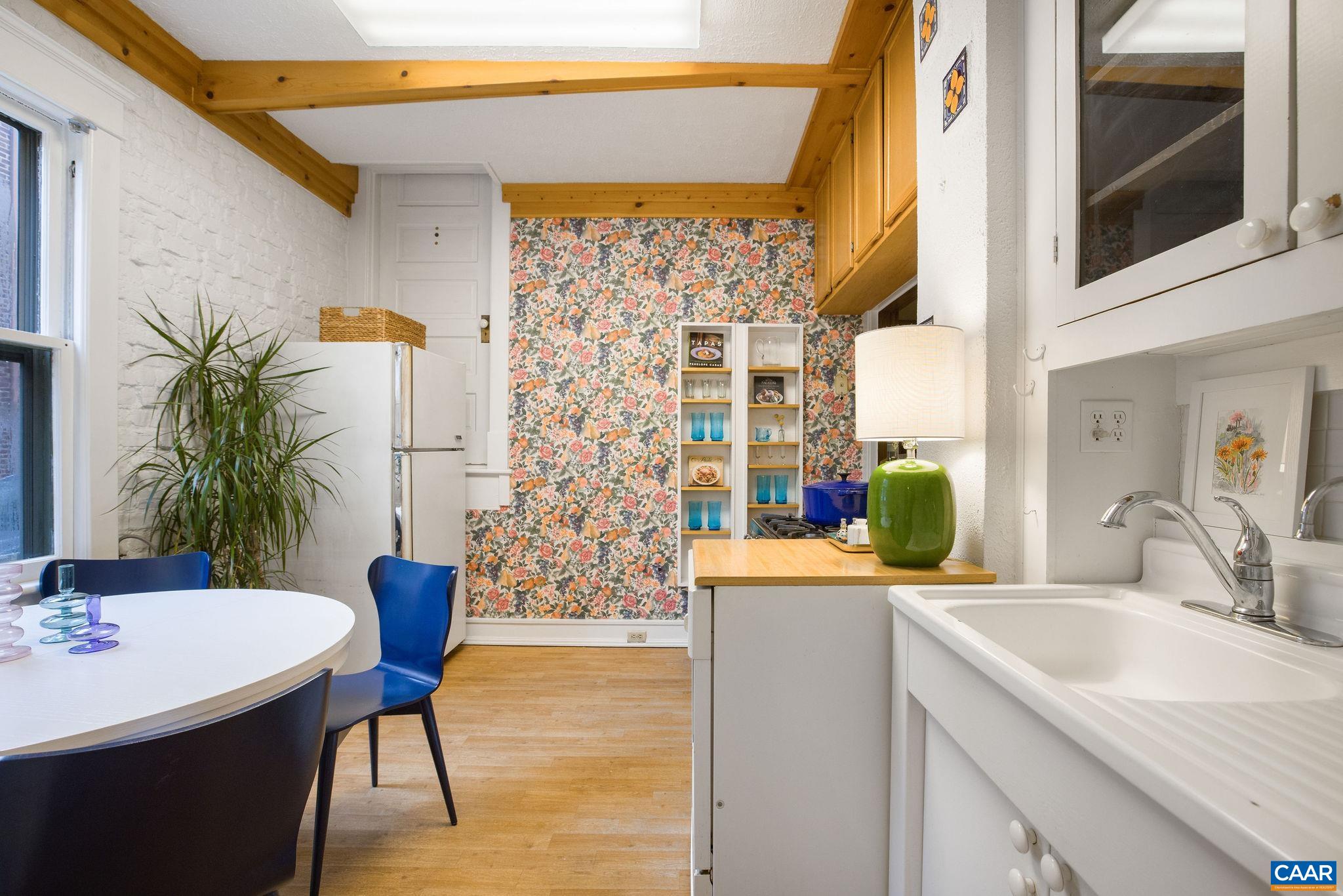 113 Altamont Circle Charlottesville, VA 22902 - Photo 13 of 43 a kitchen with a sink and a refrigerator
