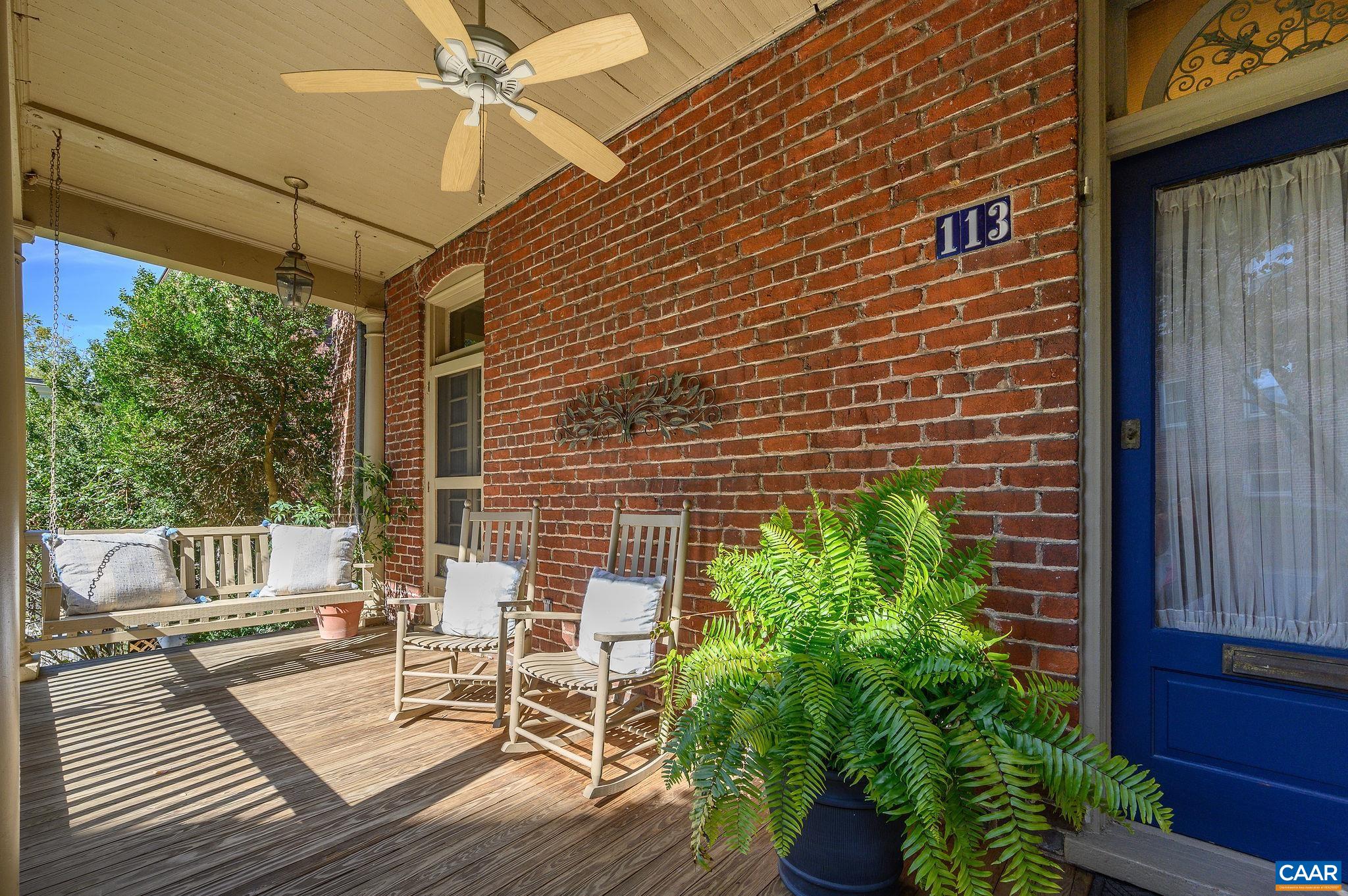113 Altamont Circle Charlottesville, VA 22902 - Photo 31 of 43 a view of a patio with table and chairs potted plants with wooden floor and floor to ceiling window