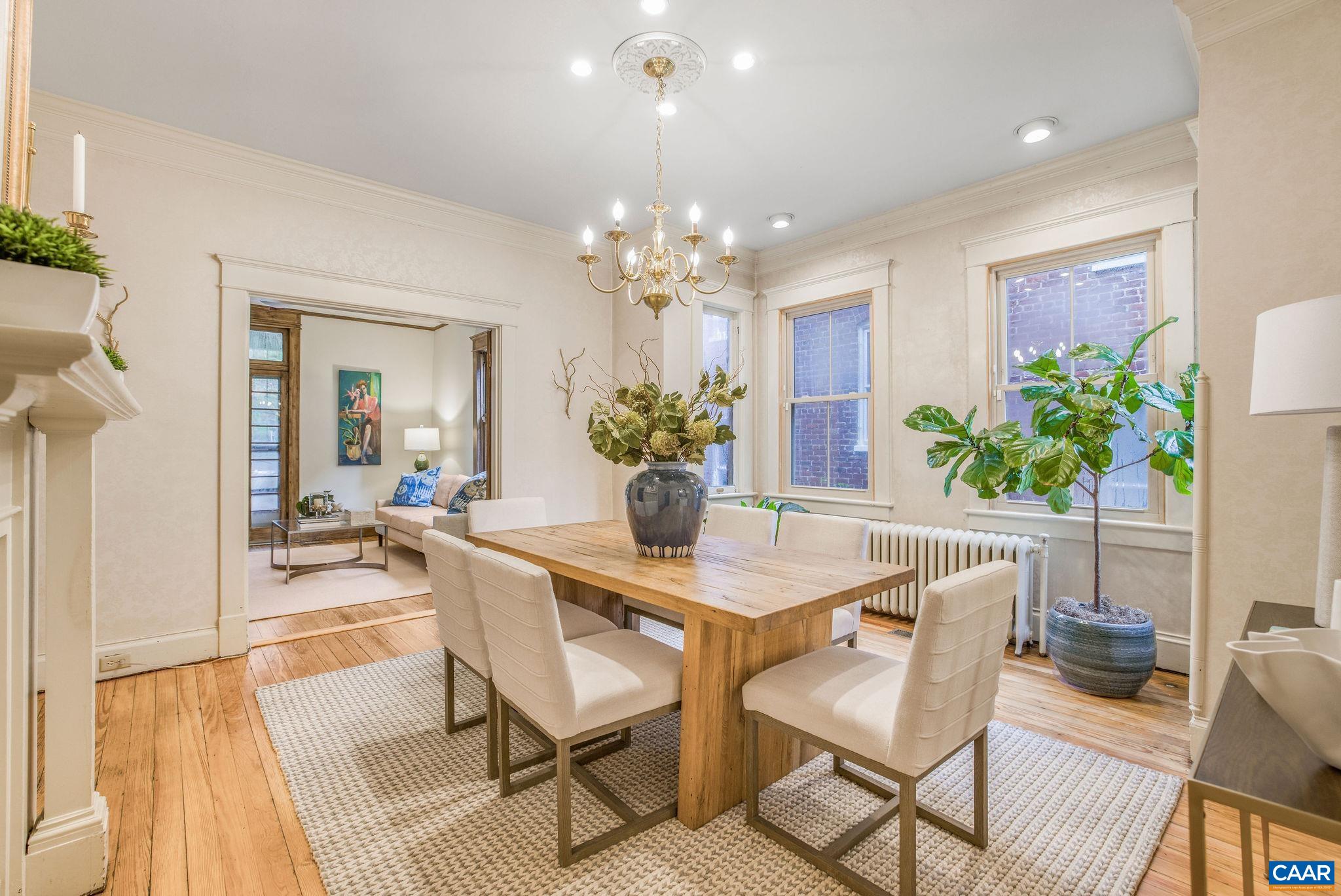 113 Altamont Circle Charlottesville, VA 22902 - Photo 10 of 43 a view of a dining room with furniture and a chandelier