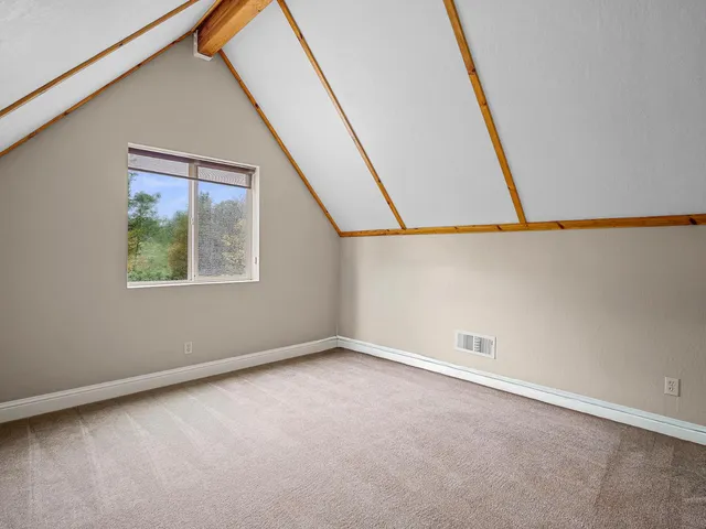 an empty room with window