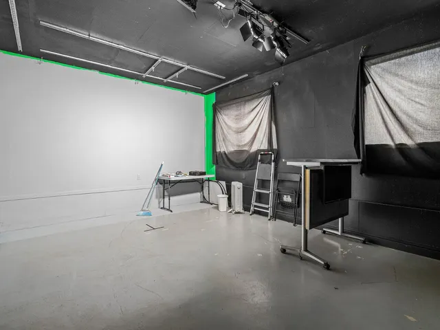 a room with table and chairs