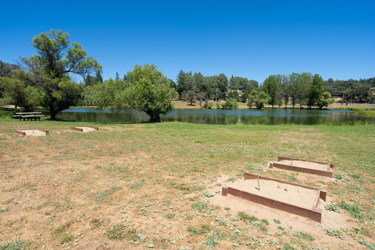 2639 Gold Court Placerville, CA 95667 - Photo 38 of 73 a view of a lake with houses in the background