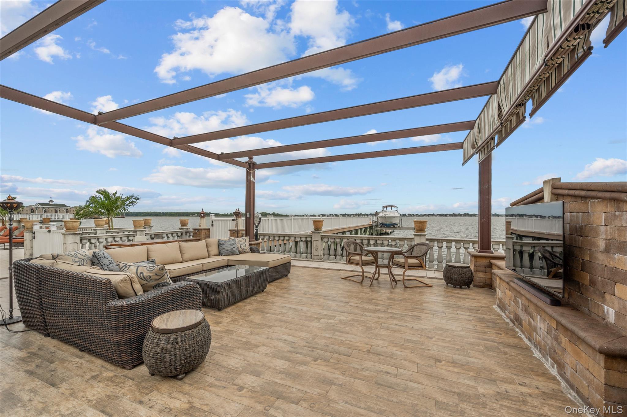 3407 Country Club Road Bronx, NY 10465 - Photo 11 of 34 View of patio / terrace featuring an outdoor living space, a pergola, and outdoor dining area