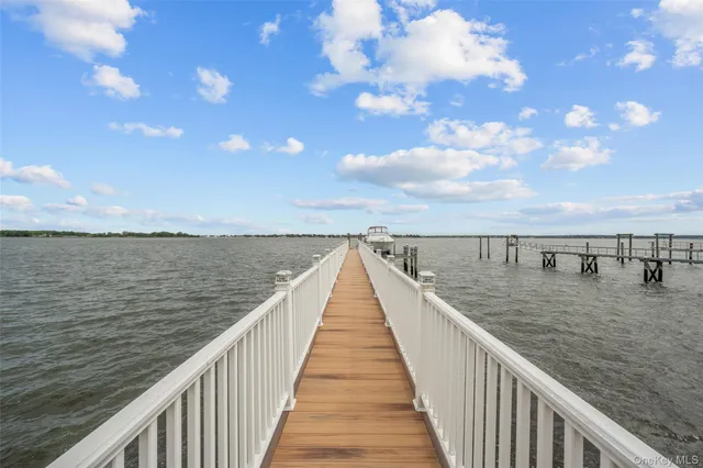 a view of front door with dining room and livingroom