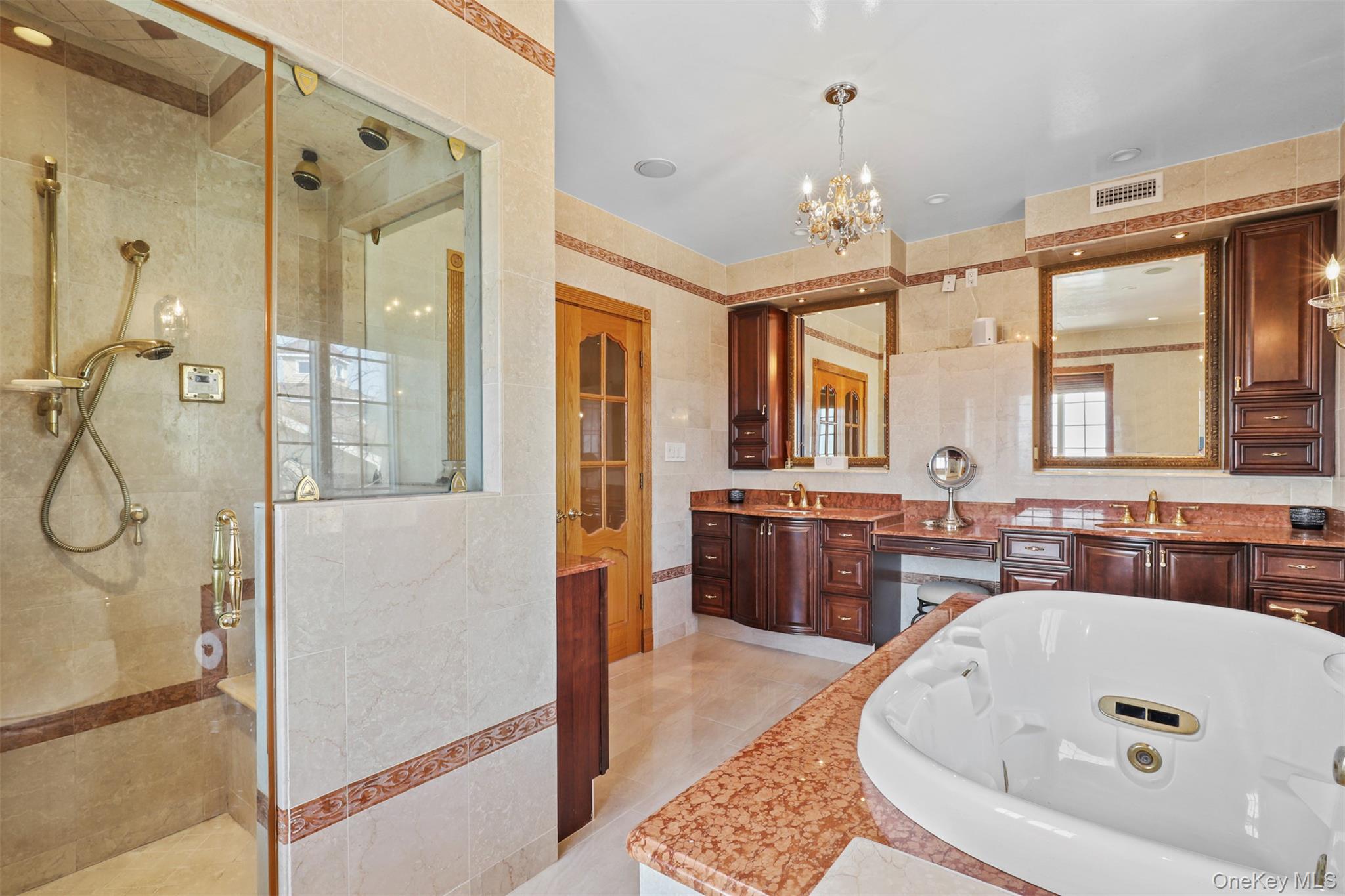 3407 Country Club Road Bronx, NY 10465 - Photo 25 of 34 Bathroom with tile walls, a tile shower, a whirlpool tub, and a sink