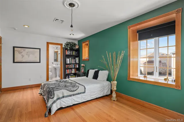 a bathroom with a sink mirror toilet and bathtub