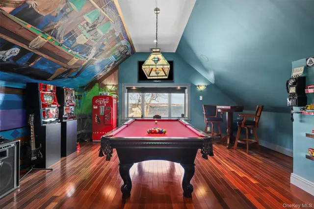 a kitchen with refrigerator and breakfast area