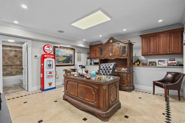 a bathroom with a sink a mirror a bathtub and a shower