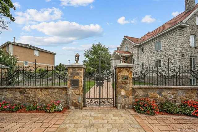 a street sign on the side of building