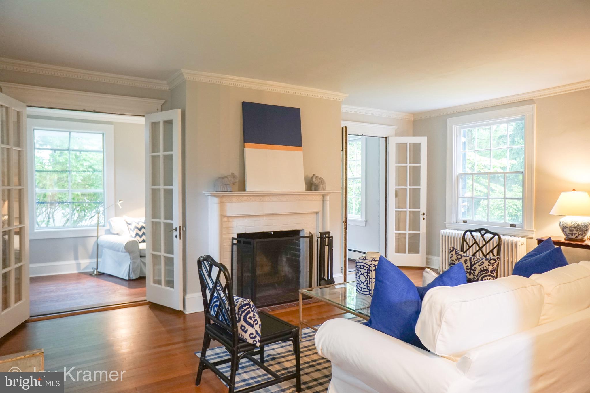4911 Falls Rd Terrace Baltimore, MD 21210 - Photo 2 of 34 Living room looking into sunroom