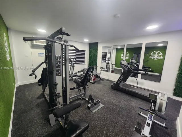 a view of a room with gym equipment
