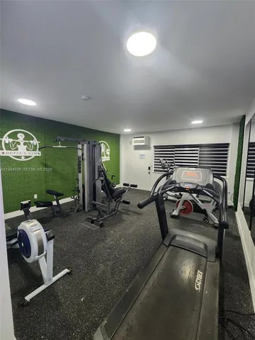 a view of a room with gym equipment