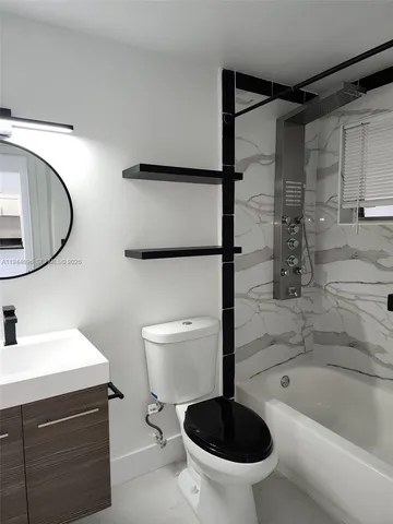 a bathroom with a bathtub
