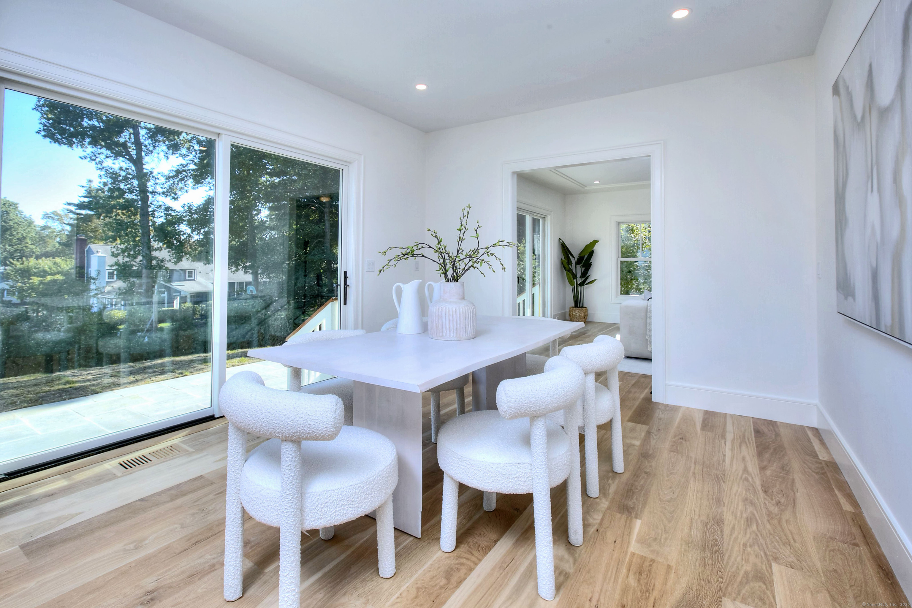 3 Hickory Hill Road Westport, CT 06880 - Photo 11 of 34 a view of a dining room with furniture and wooden floor
