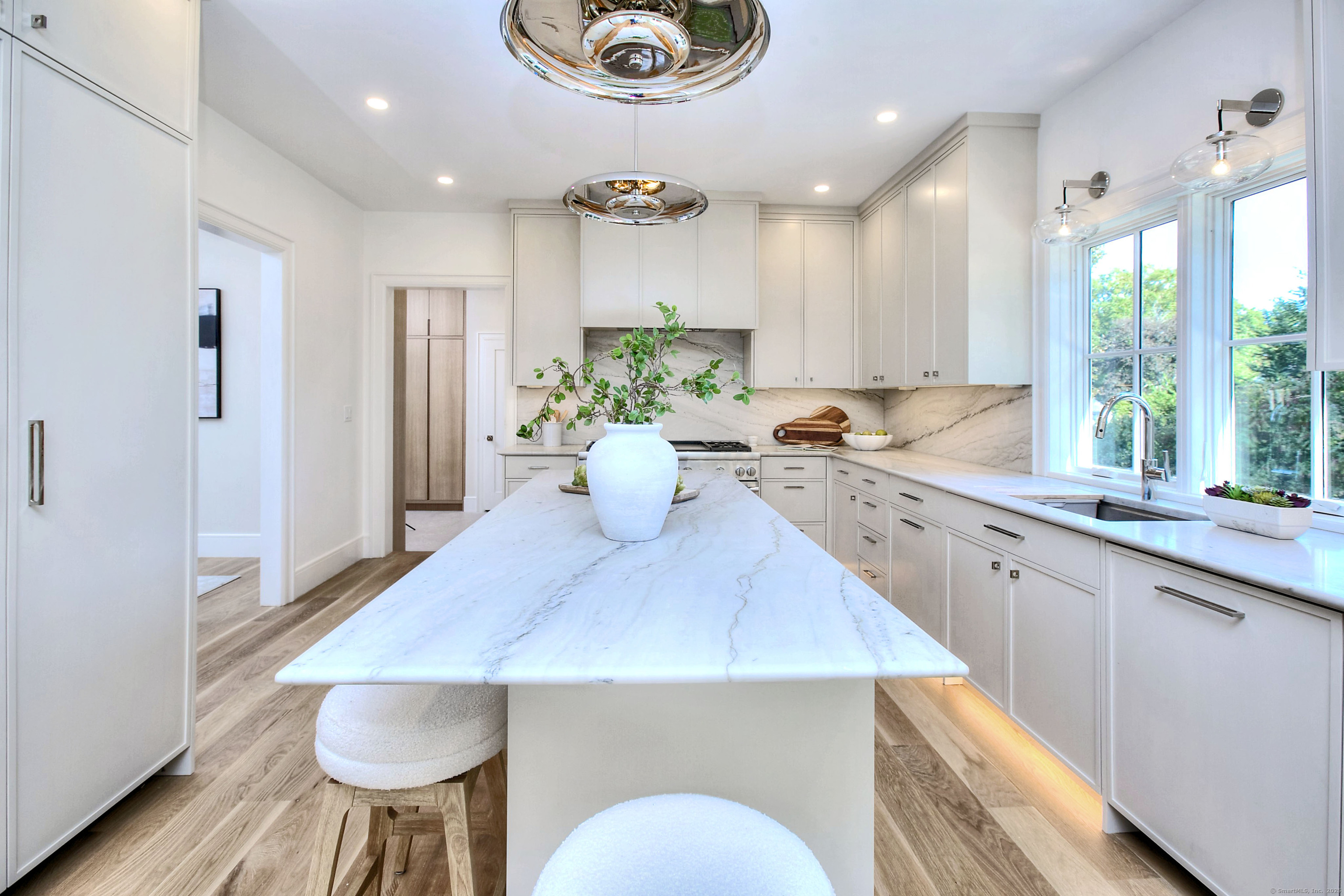 3 Hickory Hill Road Westport, CT 06880 - Photo 12 of 34 a kitchen with a table and chairs