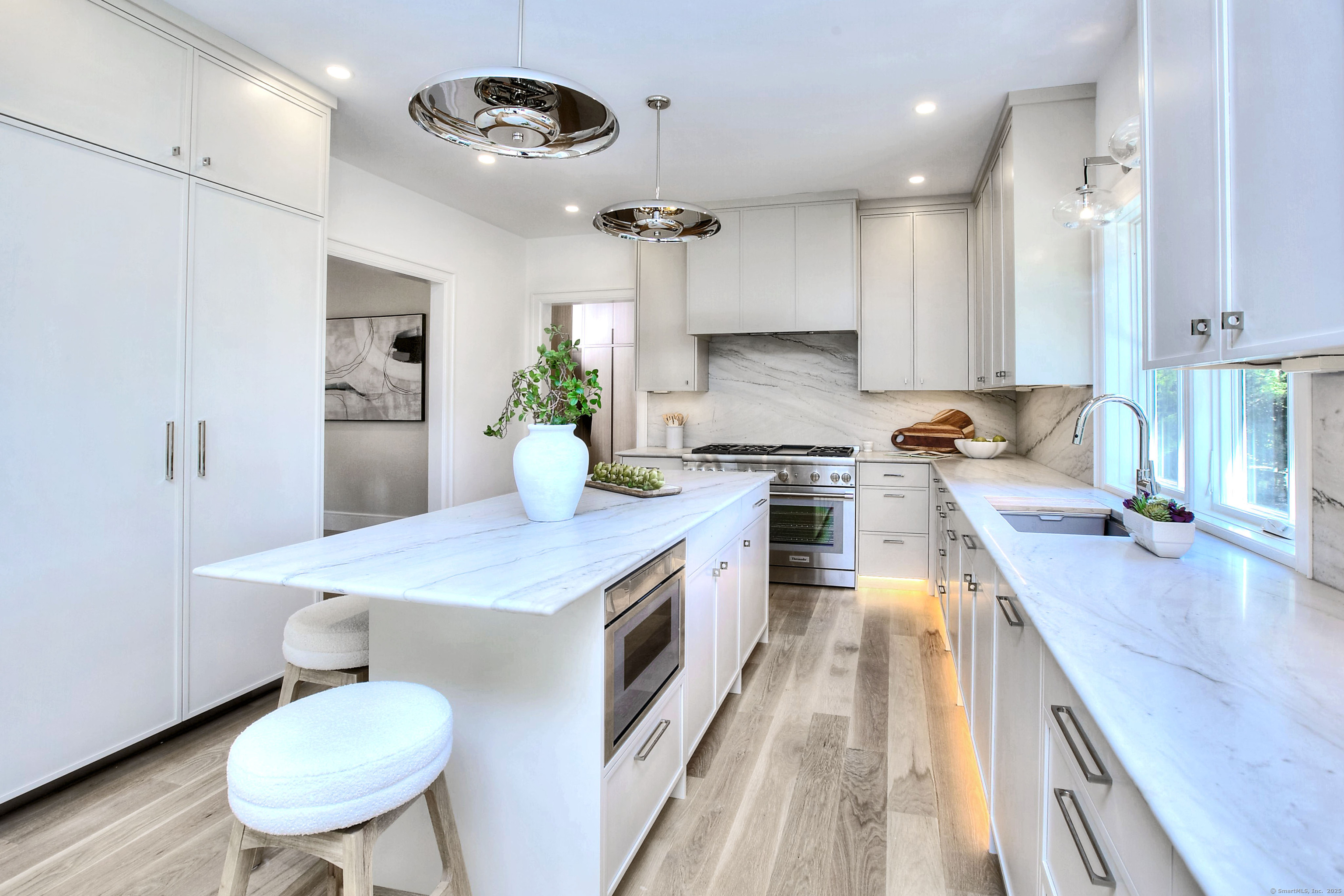 3 Hickory Hill Road Westport, CT 06880 - Photo 15 of 34 a kitchen with stainless steel appliances granite countertop a sink stove and refrigerator