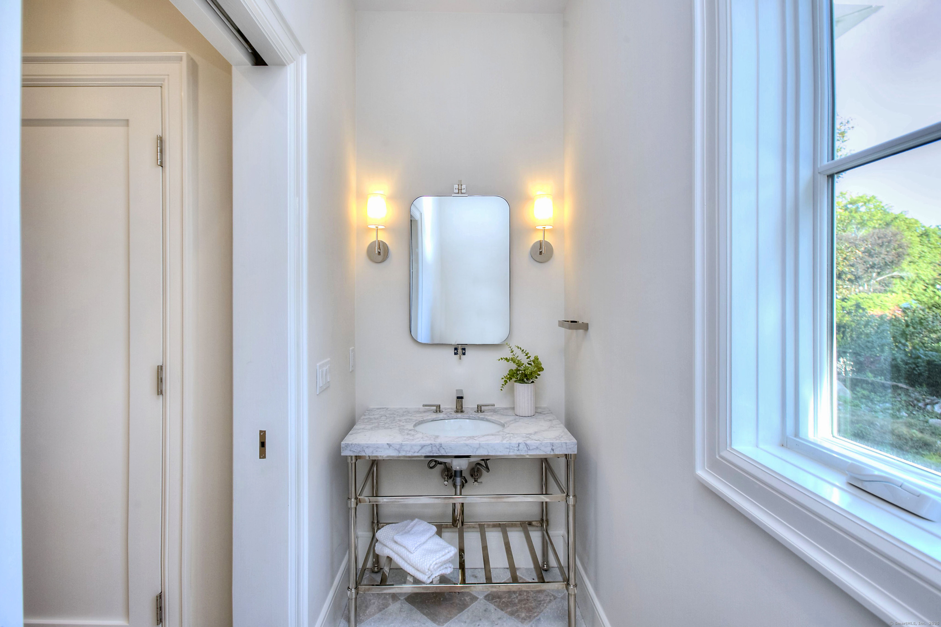 3 Hickory Hill Road Westport, CT 06880 - Photo 17 of 34 a bathroom with a sink and a mirror