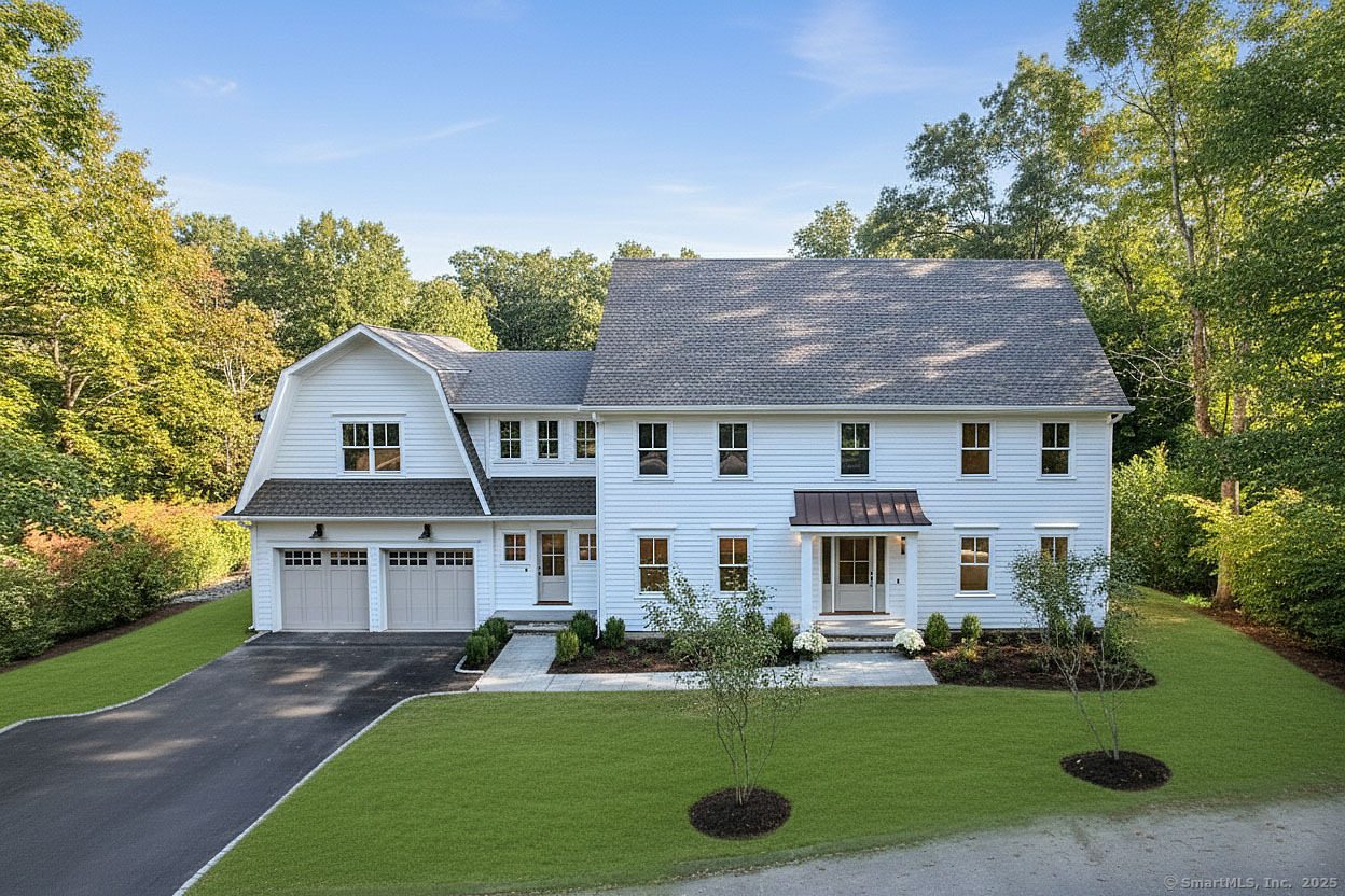 3 Hickory Hill Road Westport, CT 06880 - Photo 2 of 34 front view of a house with a yard