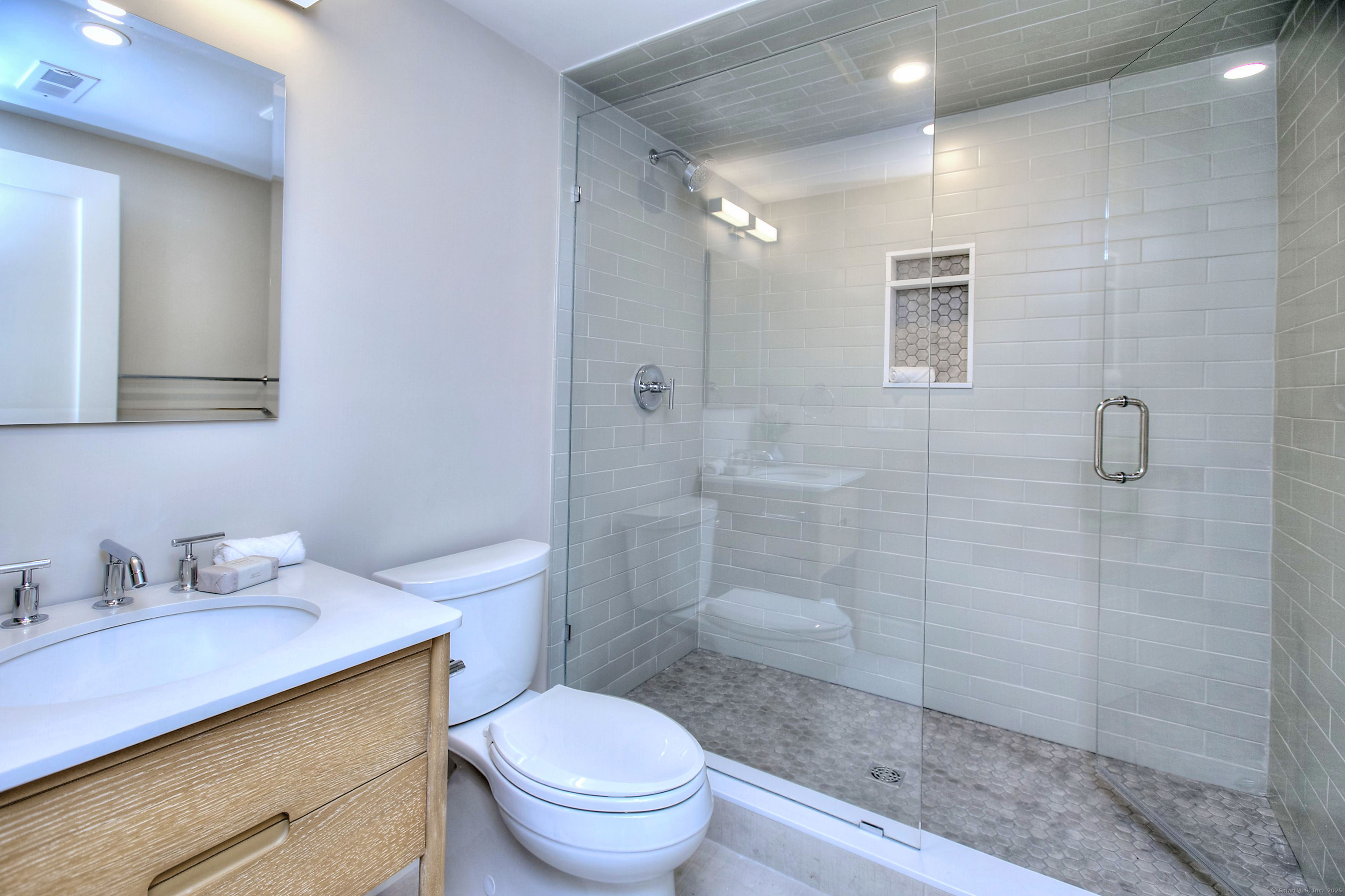 3 Hickory Hill Road Westport, CT 06880 - Photo 31 of 34 a bathroom with a sink a toilet and shower