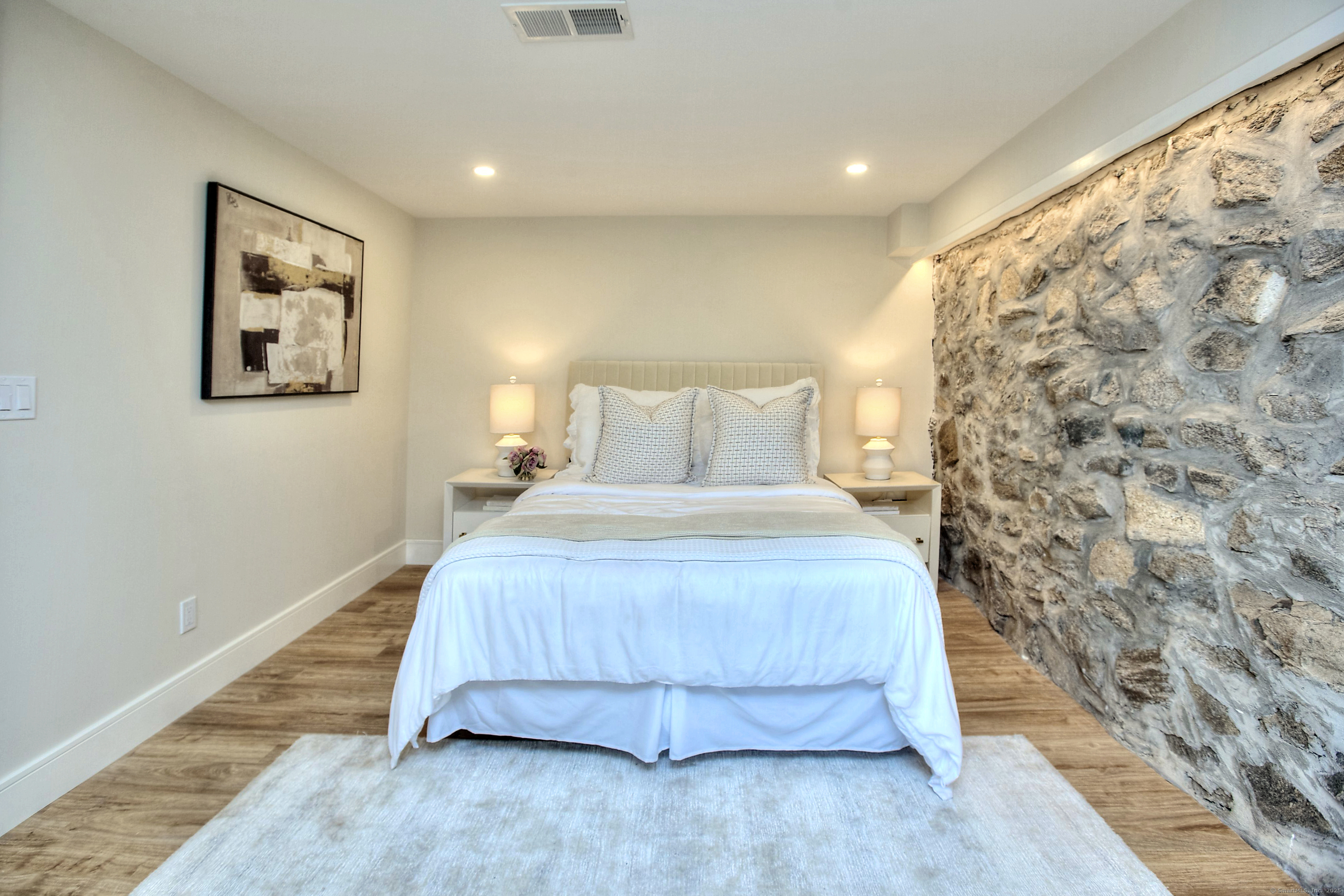 3 Hickory Hill Road Westport, CT 06880 - Photo 32 of 34 a bedroom with a bed and a painting on the wall