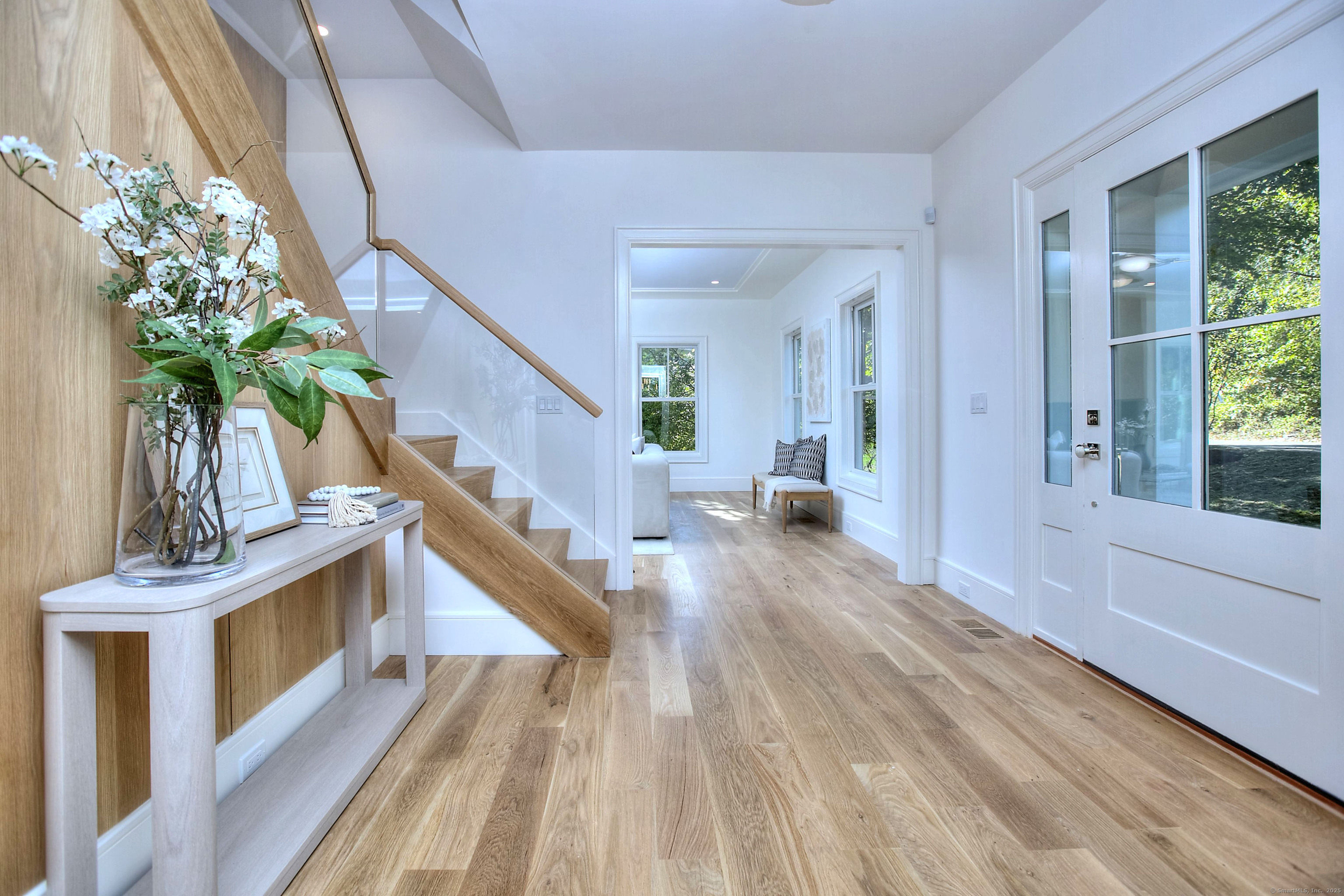 3 Hickory Hill Road Westport, CT 06880 - Photo 5 of 34 a view of entryway and hall with wooden floor