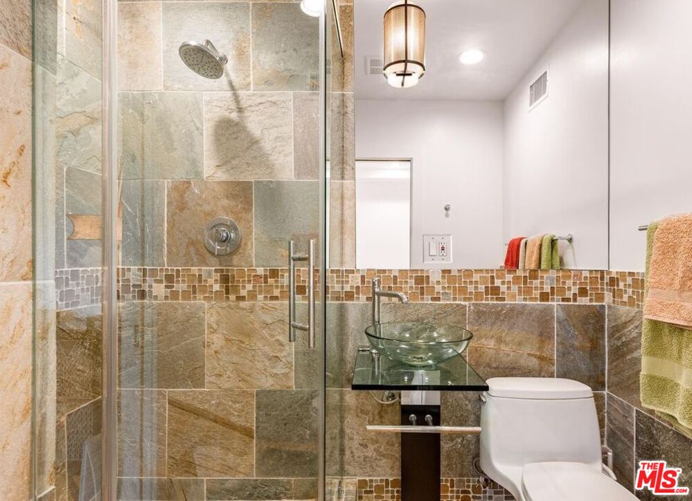 3116-unit A Johnston Street Los Angeles, CA 90031 - Photo 3 of 13 a bathroom with a toilet shower and a sink