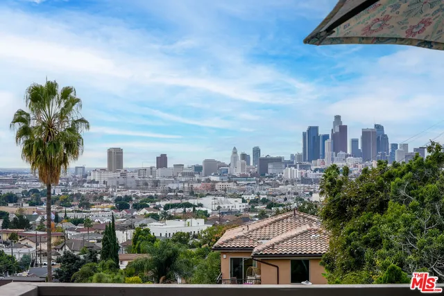 a view of a city with tall buildings