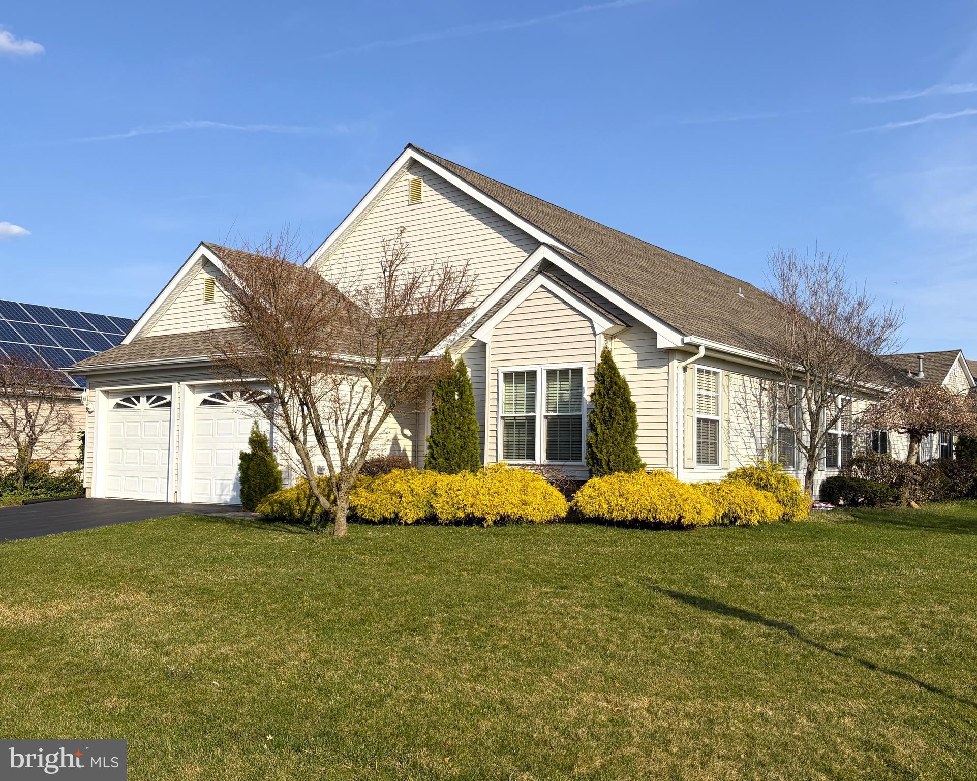 7 Ivy Hill Road Lakewood, NJ 08701 - Photo 1 of 51 a front view of a house with a yard
