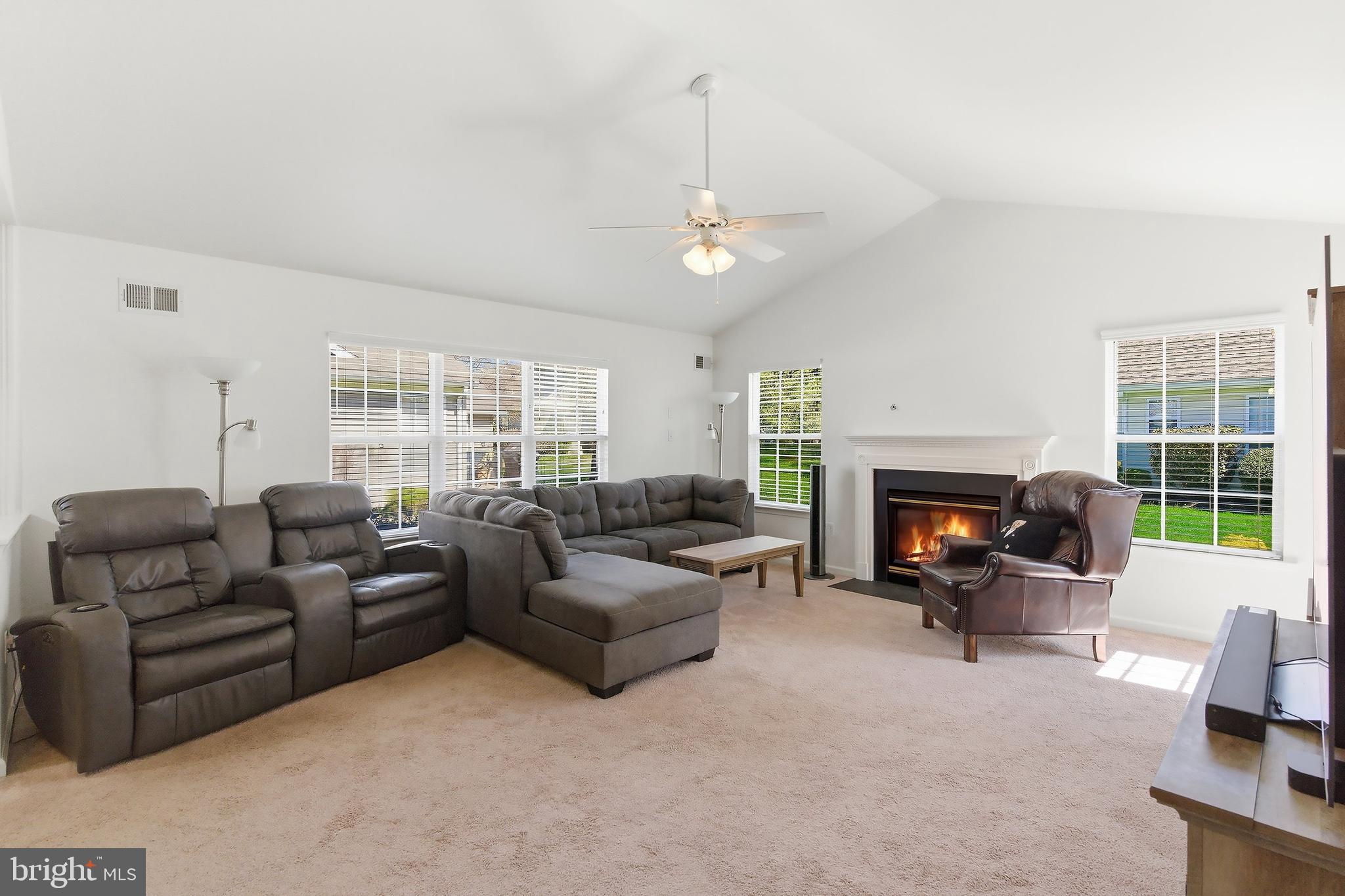 7 Ivy Hill Road Lakewood, NJ 08701 - Photo 13 of 51 a living room with furniture and a fireplace