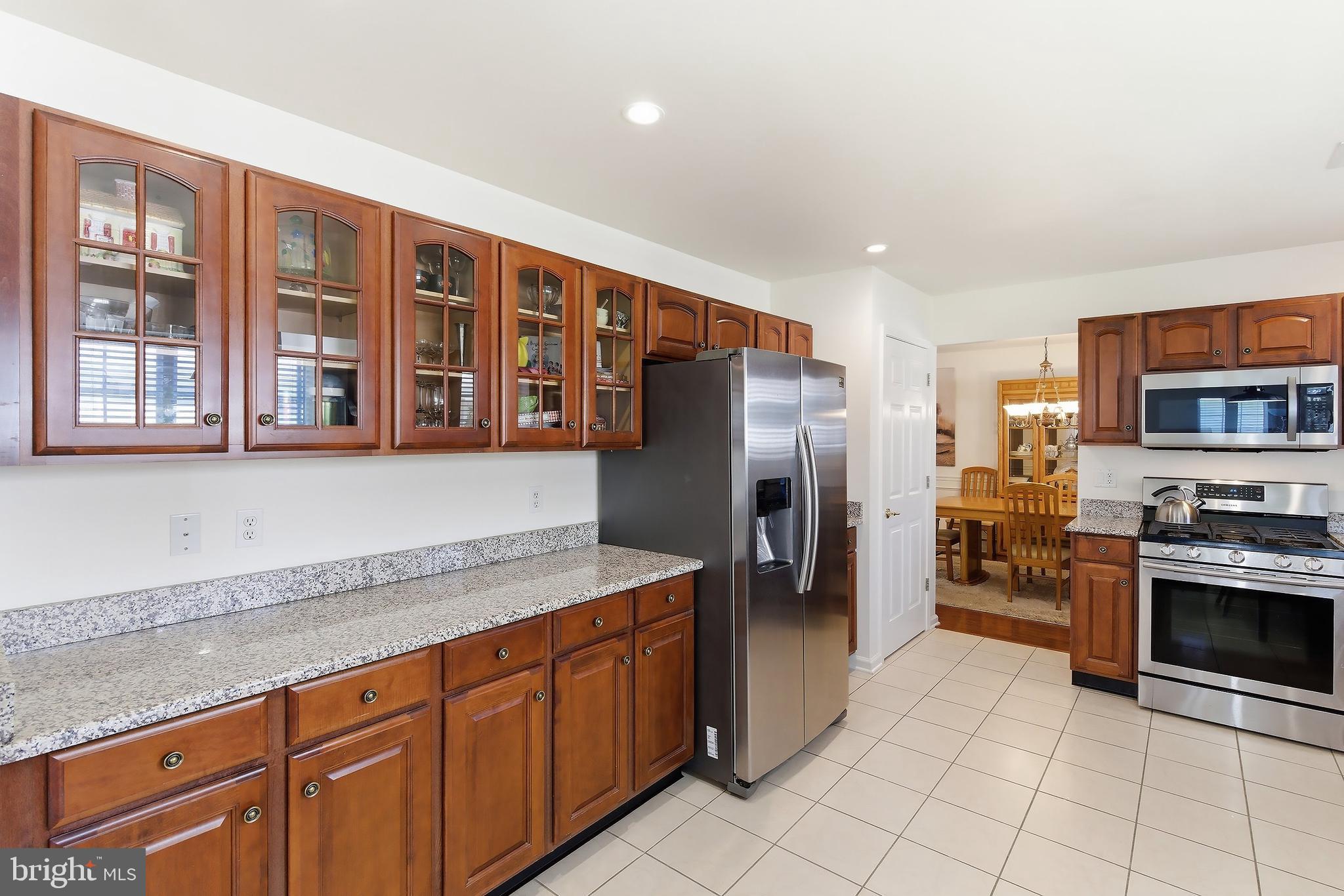 7 Ivy Hill Road Lakewood, NJ 08701 - Photo 18 of 51 a kitchen with stainless steel appliances granite countertop a refrigerator and a sink