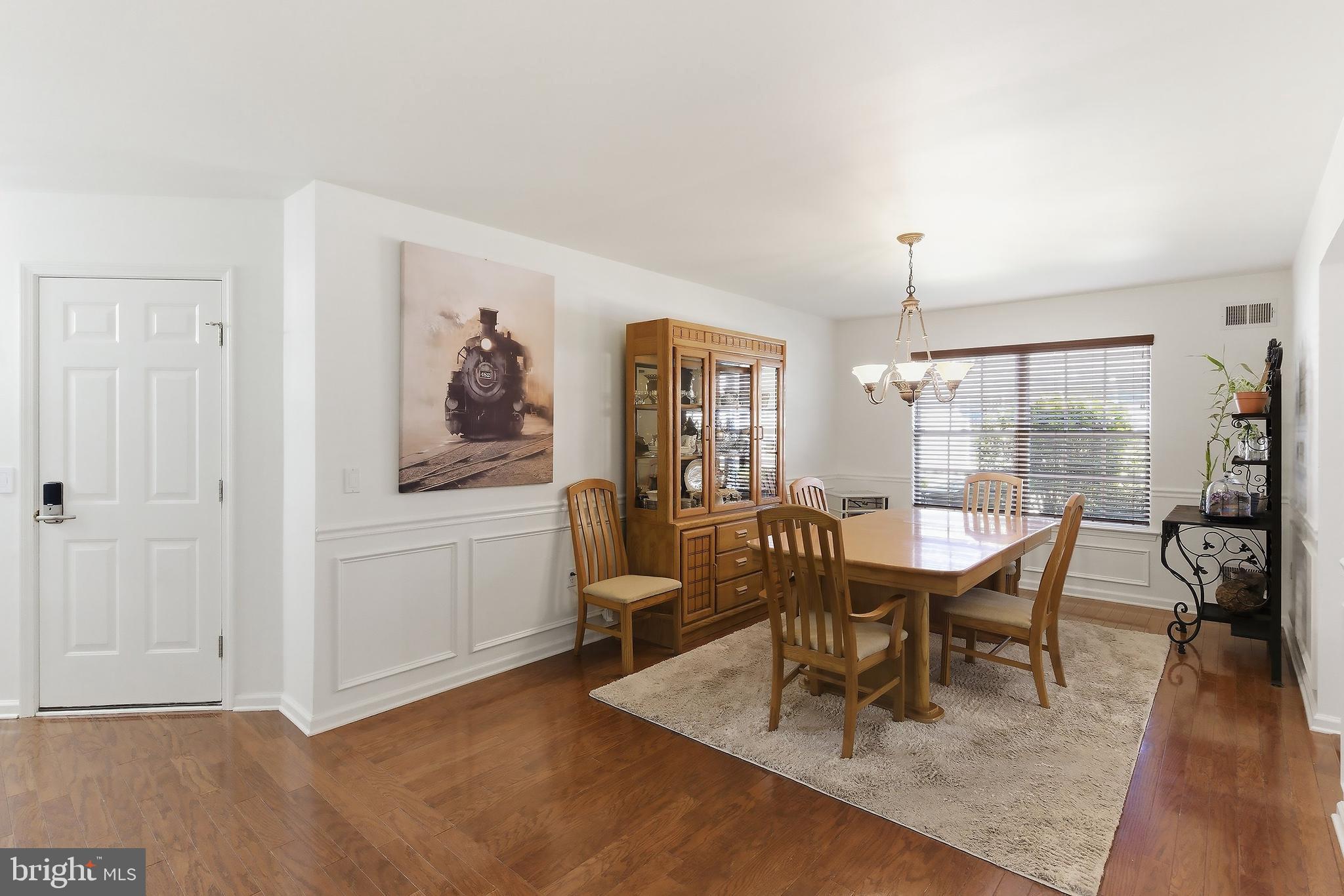 7 Ivy Hill Road Lakewood, NJ 08701 - Photo 20 of 51 a view of a dining room with furniture window and wooden floor