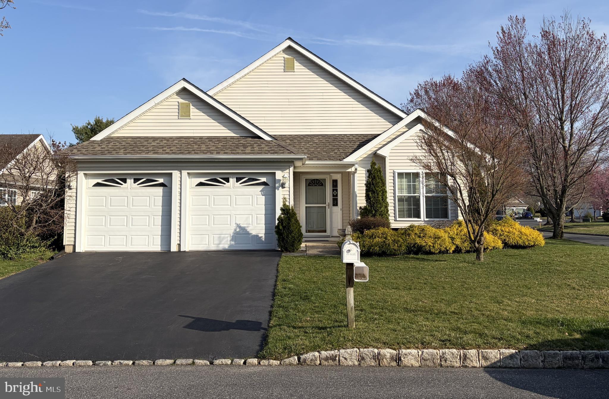 7 Ivy Hill Road Lakewood, NJ 08701 - Photo 2 of 51 a front view of a house with a yard