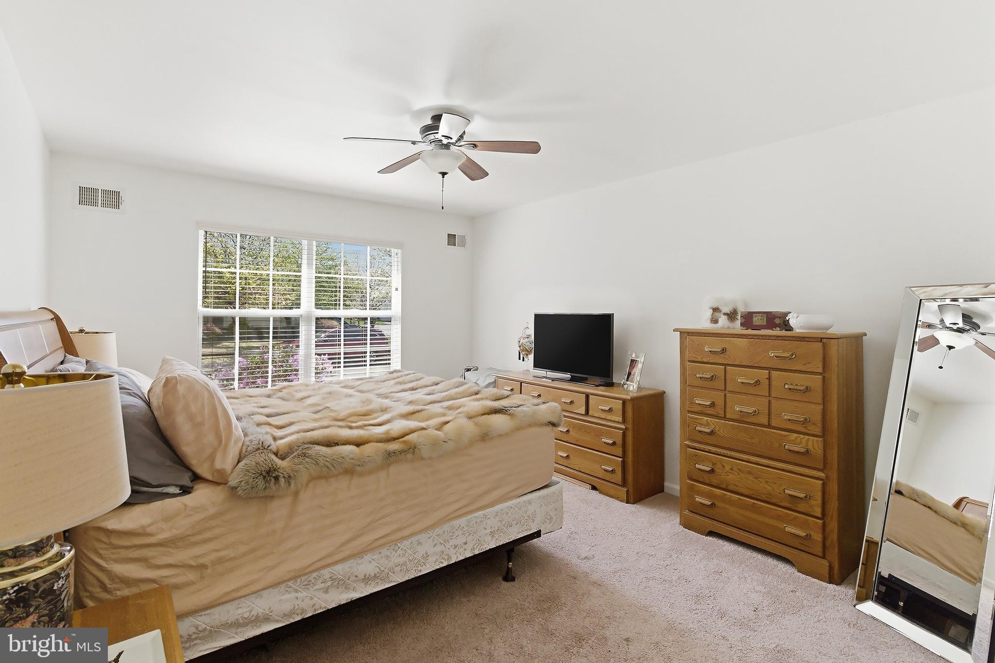 7 Ivy Hill Road Lakewood, NJ 08701 - Photo 25 of 51 a bedroom with a bed and furniture