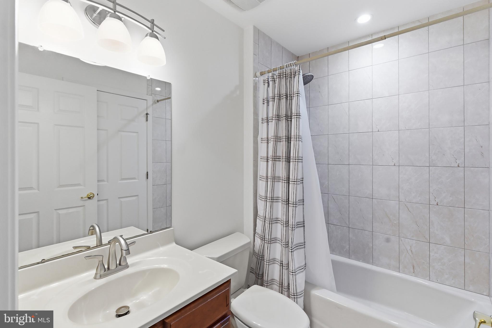7 Ivy Hill Road Lakewood, NJ 08701 - Photo 27 of 51 a bathroom with a sink toilet and shower