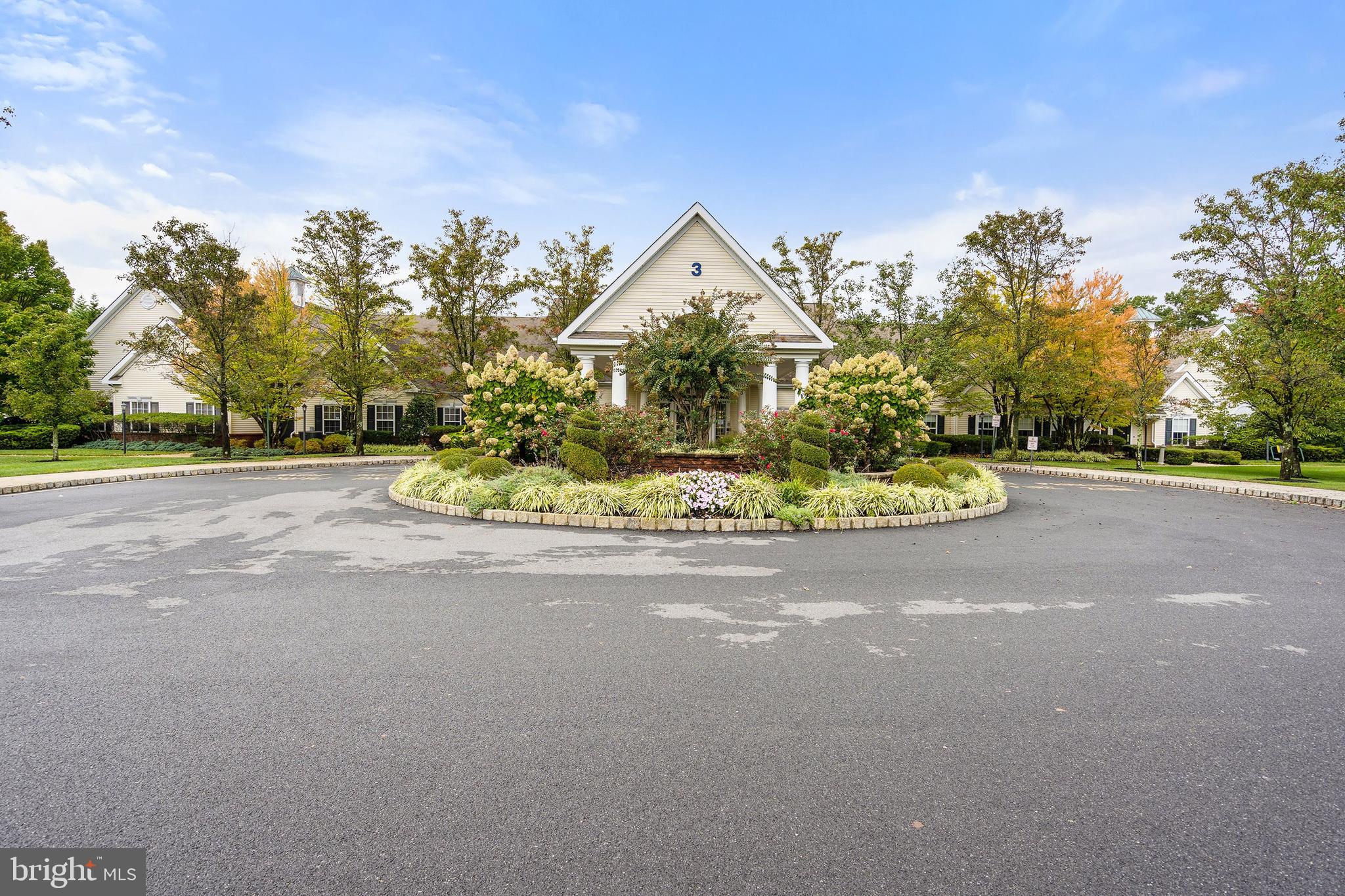 7 Ivy Hill Road Lakewood, NJ 08701 - Photo 42 of 51 a front view of a house with a yard and garage