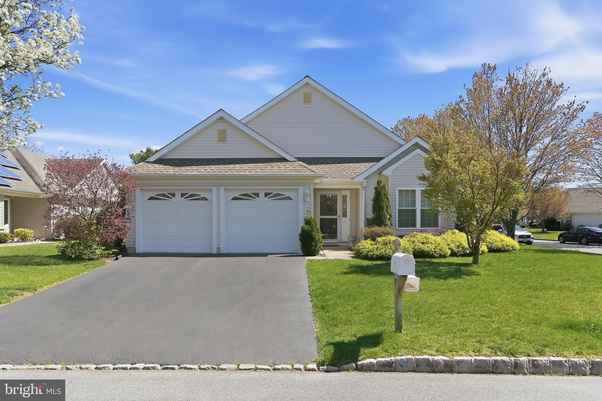 7 Ivy Hill Road Lakewood, NJ 08701 - Photo 6 of 51 a front view of a house with garden