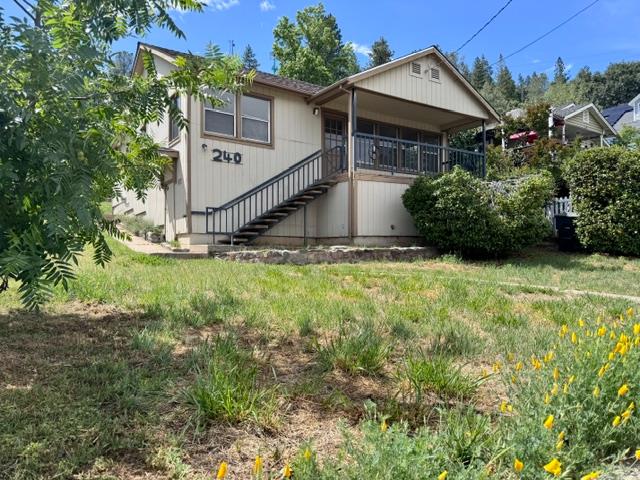240 Pleasant Street Colfax, CA 95713 - Photo 26 of 26 a view of house with backyard and garden
